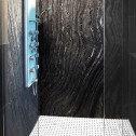 Ancient Woodgrain Bolder Stone Panel installed in a shower