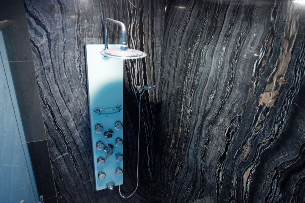 Ancient Woodgrain Bolder Panels installed in a luxurious shower