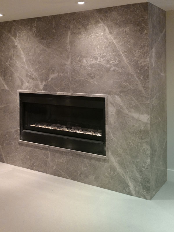 Silver Shadow Bolder Panel installed on a fireplace