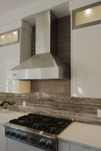 Persian Silver Bolder Stone Panel installed as a kitchen backsplash