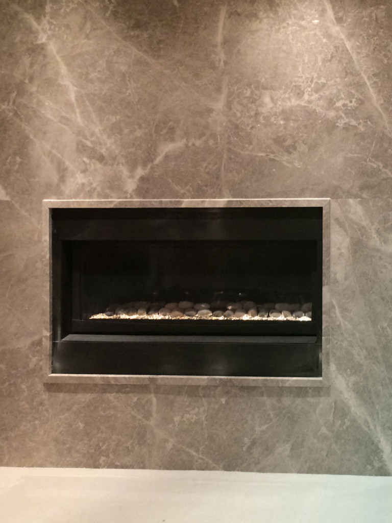 Silver Shadow Fireplace with matching moulding around fireplace insert